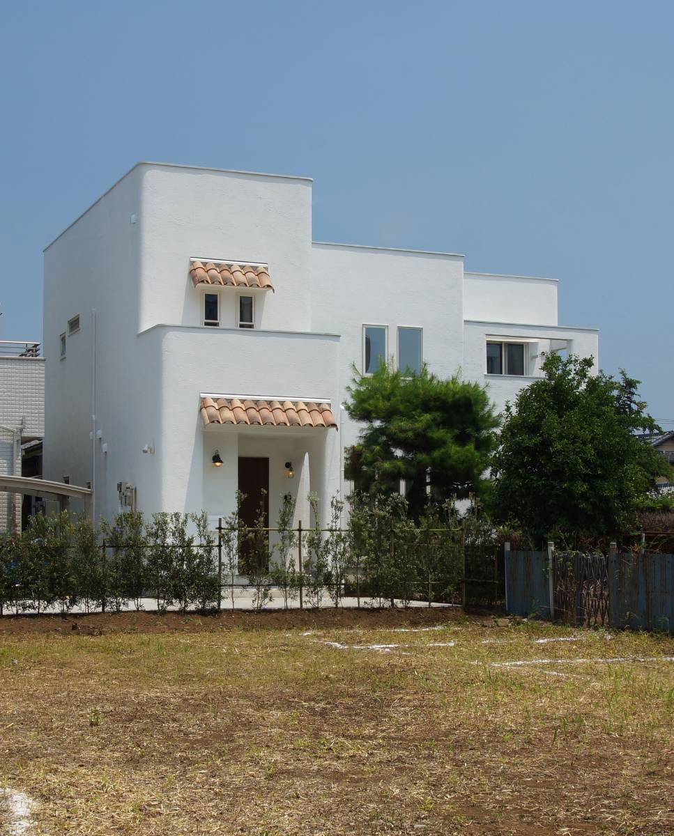 住まい手を優しく包みこむ家